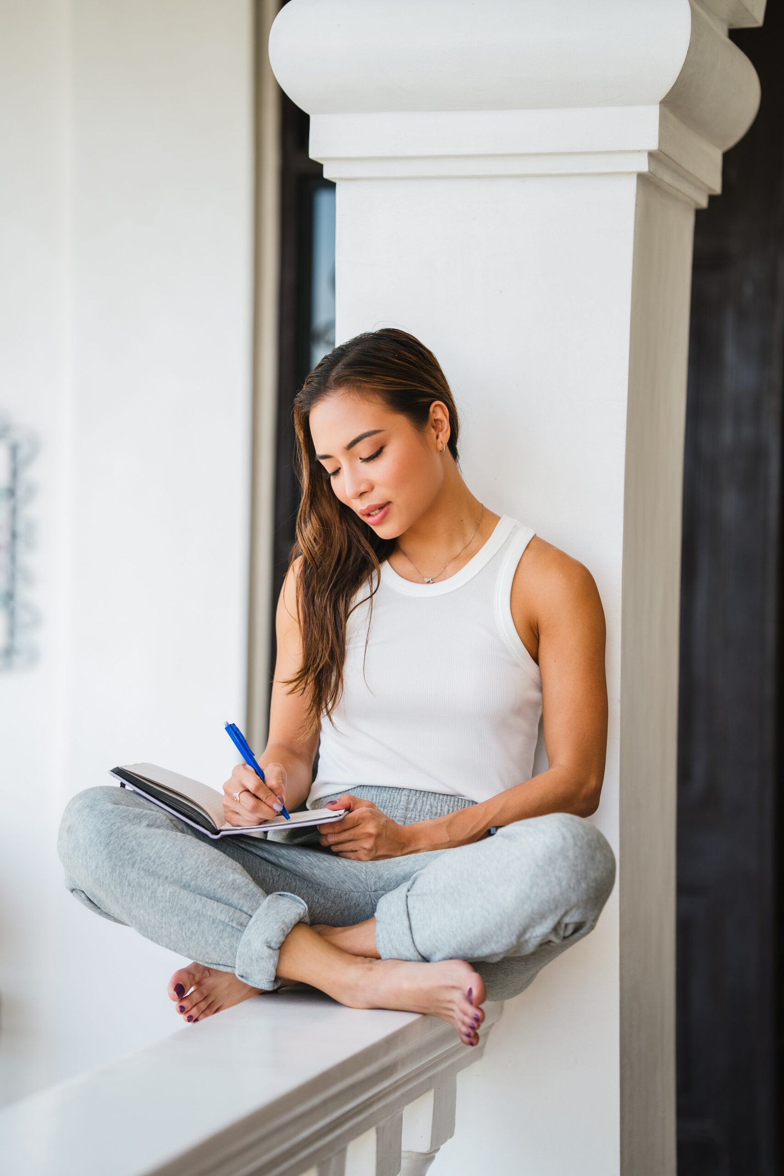 Woman journaling during a deep-work morning